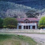 Looking Down Market Street in Glen Davis, New South Wales, towards the Commercial Hotel late 1980’s, old butcher shop on left hand side.