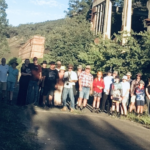 Glen Davis Tour participants 20250419 power house and retort in background.