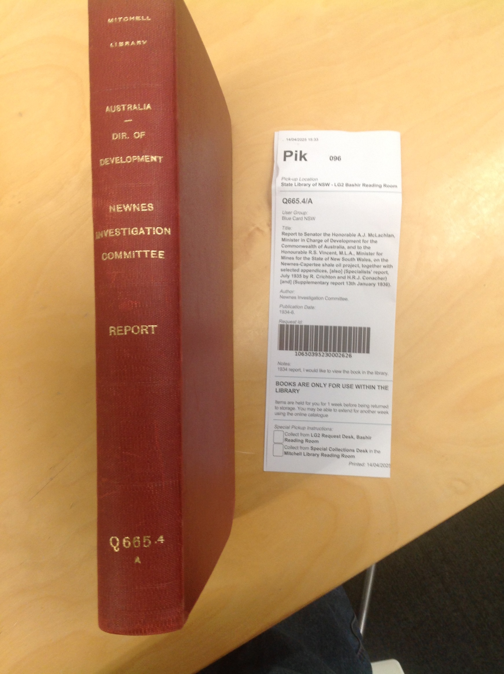 Mitchell Library of State of NSW book cover for The Newnes Investigation report with reference details for library. The cover is a red with gold writing.